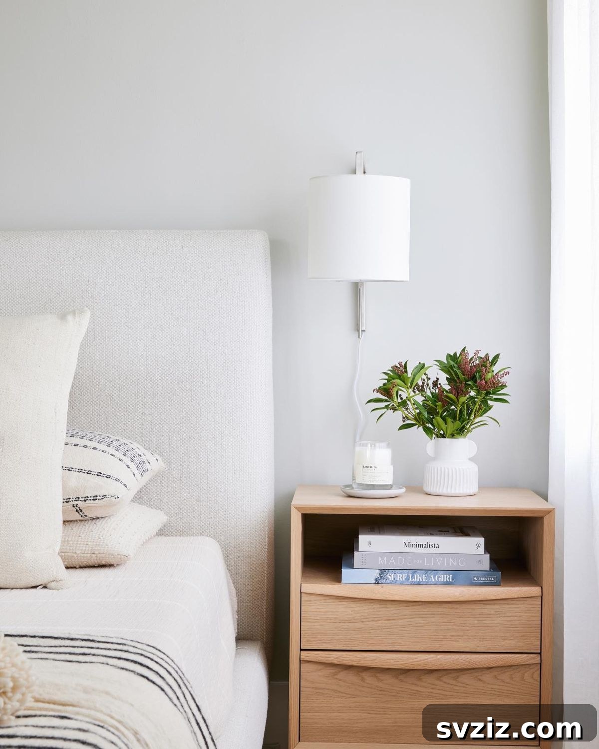 Effortless Bedroom Organization for a Clutter-Free Sanctuary 17 A bedside table with drawers and shelves allows for a clutter-free surface, keeping essentials organized and accessible.