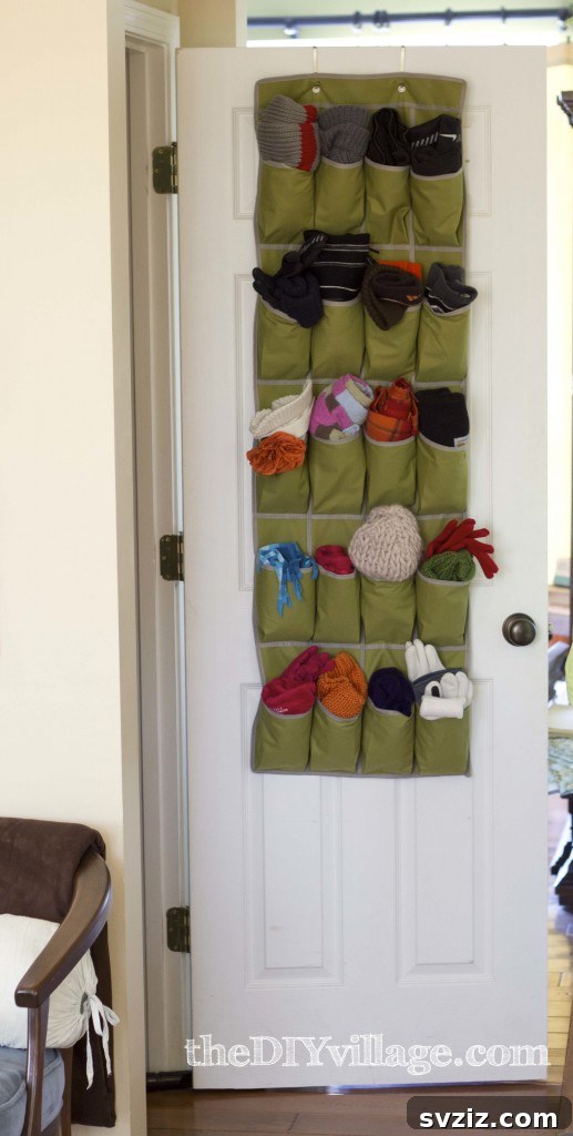 Effortless Bedroom Organization for a Clutter-Free Sanctuary 18 Over-the-door organizer for scarves, hats, belts, or purses, maximizing unused vertical space in your bedroom or closet.