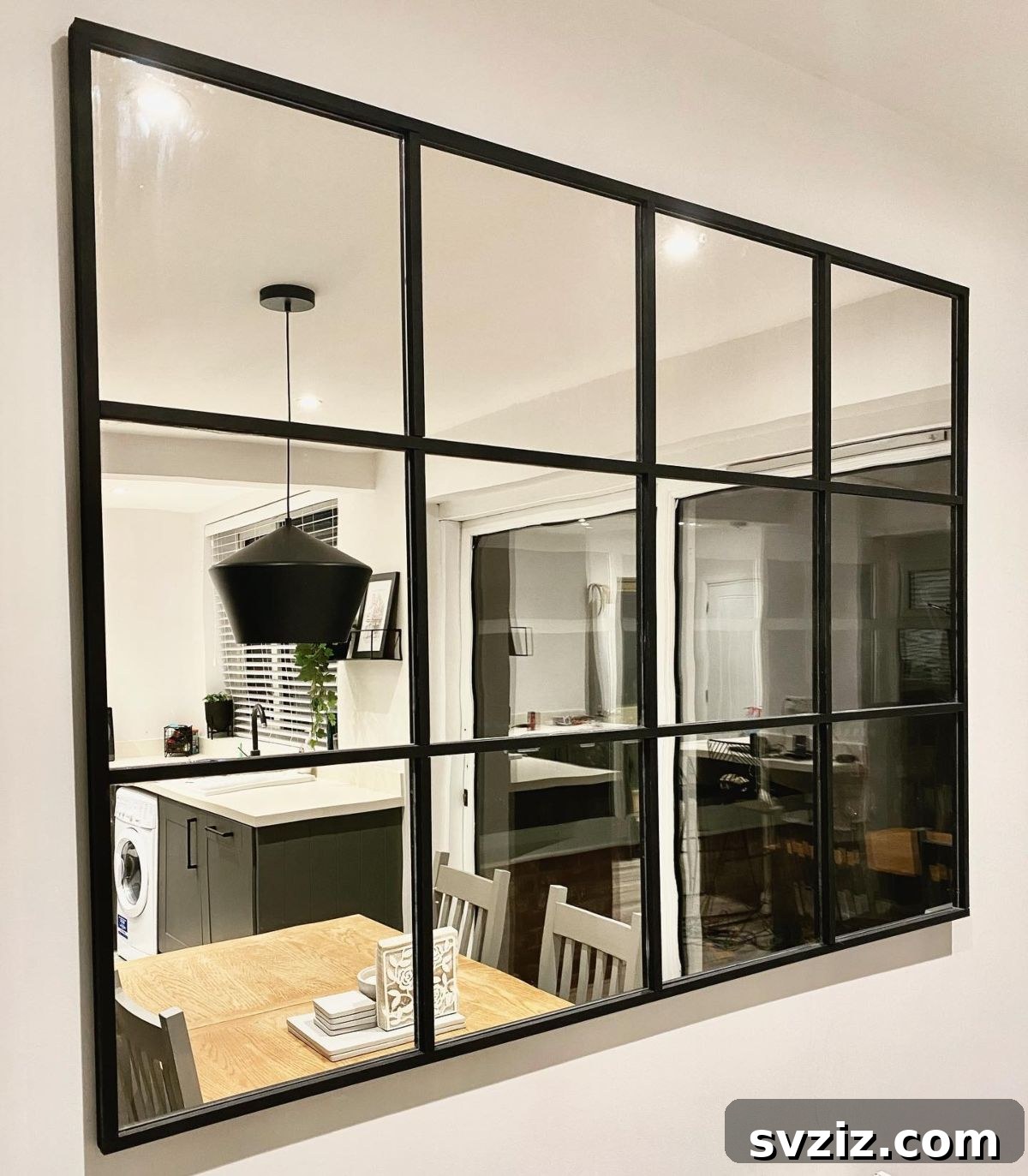 21 Genius IKEA Transformations for Your Home 20 Large statement mirror wall created by joining multiple IKEA mirrors with a custom frame