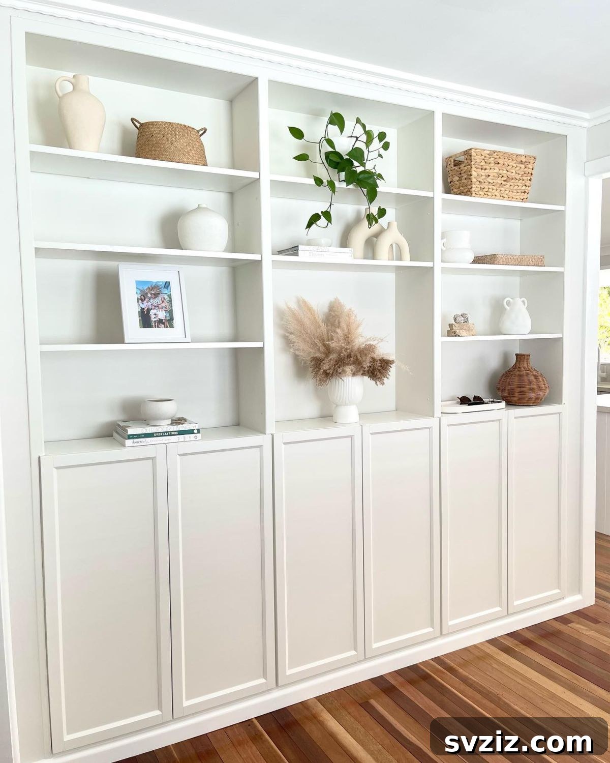 21 Genius IKEA Transformations for Your Home 6 IKEA Billy and Oxberg bookcase series transformed into a custom built-in cabinet