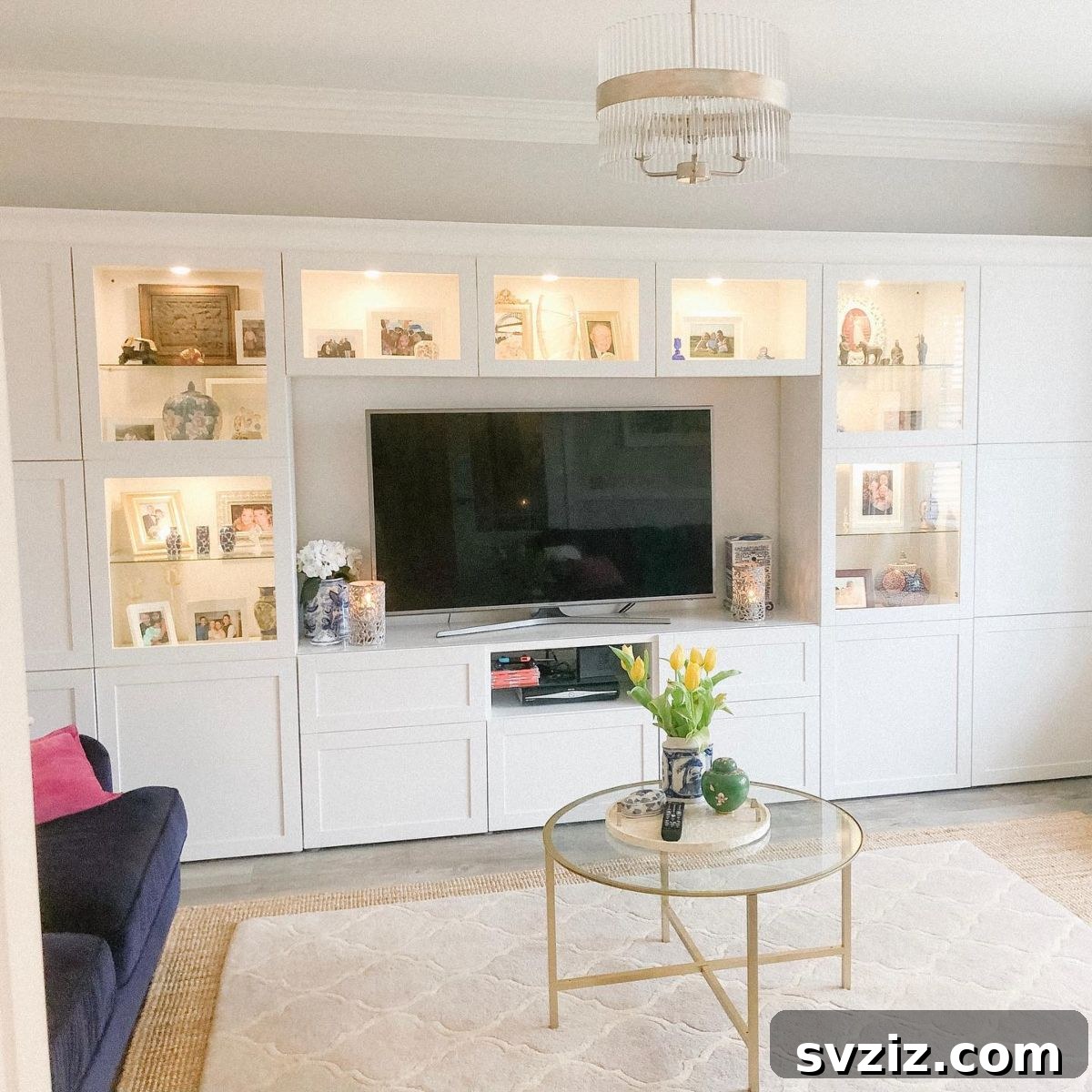 21 Genius IKEA Transformations for Your Home 10 IKEA Besta units integrated into a living room wall unit with custom lighting