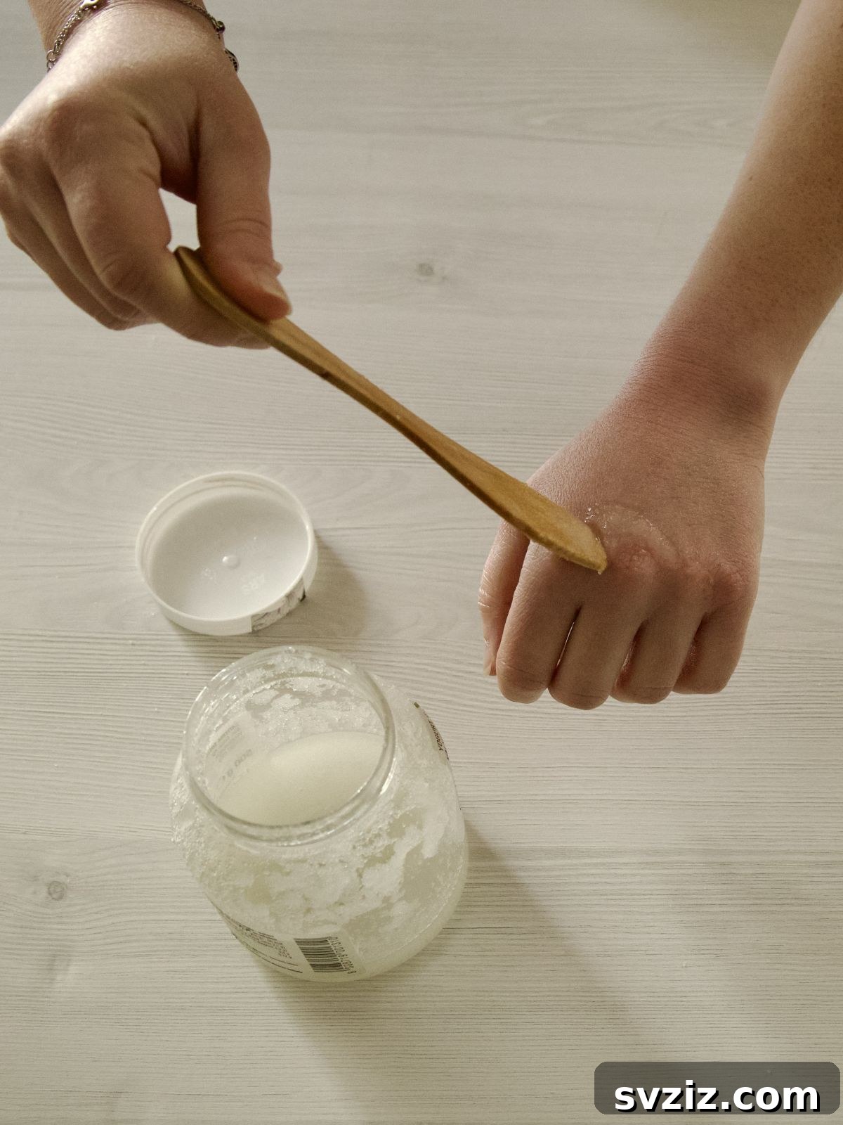 Homemade hand scrub with sugar and coconut oil