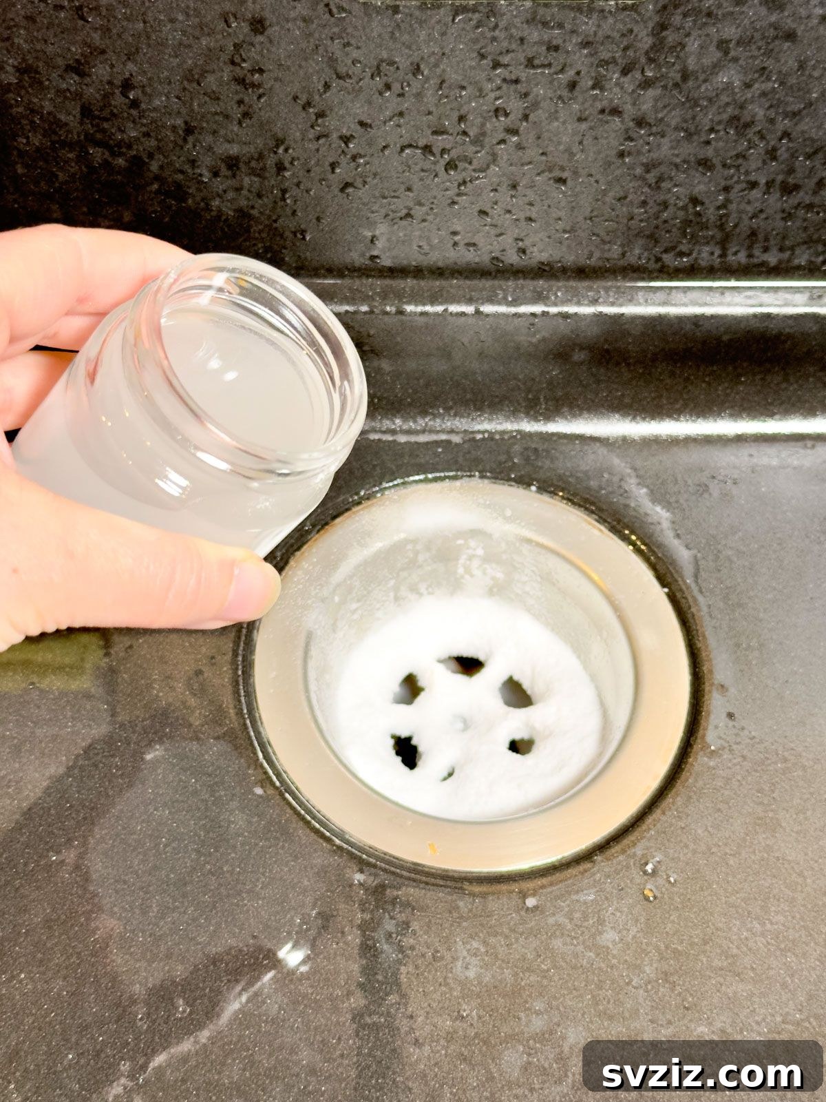 Clean Kitchen Sink with Baking Soda and Vinegar