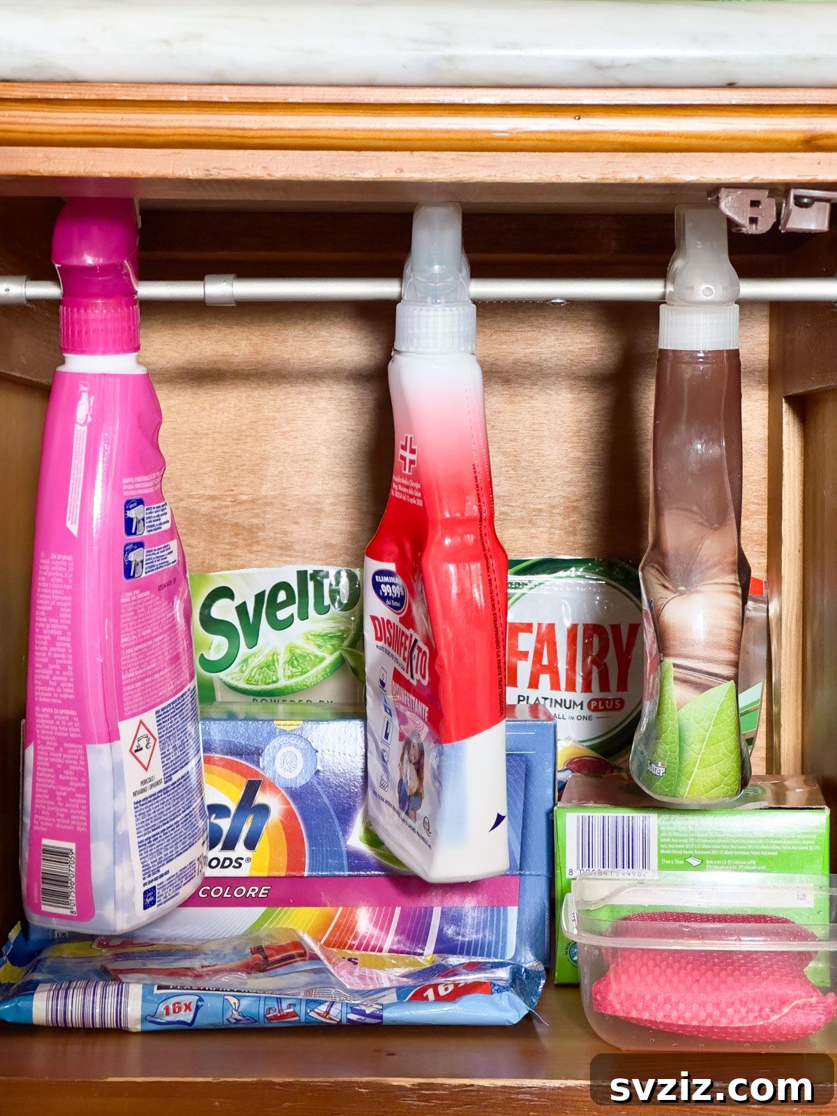 Use a Tension Rod to Hang Detergents - creative laundry organization