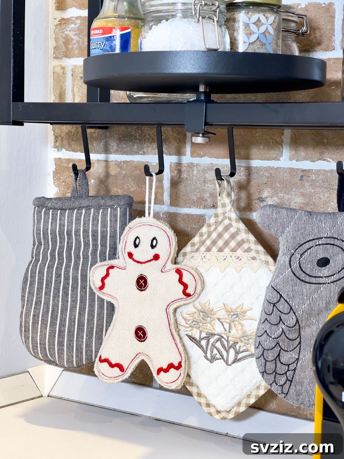 Set Up Some Hooks in the Kitchen to Hang Potholders - practical kitchen decor and organization