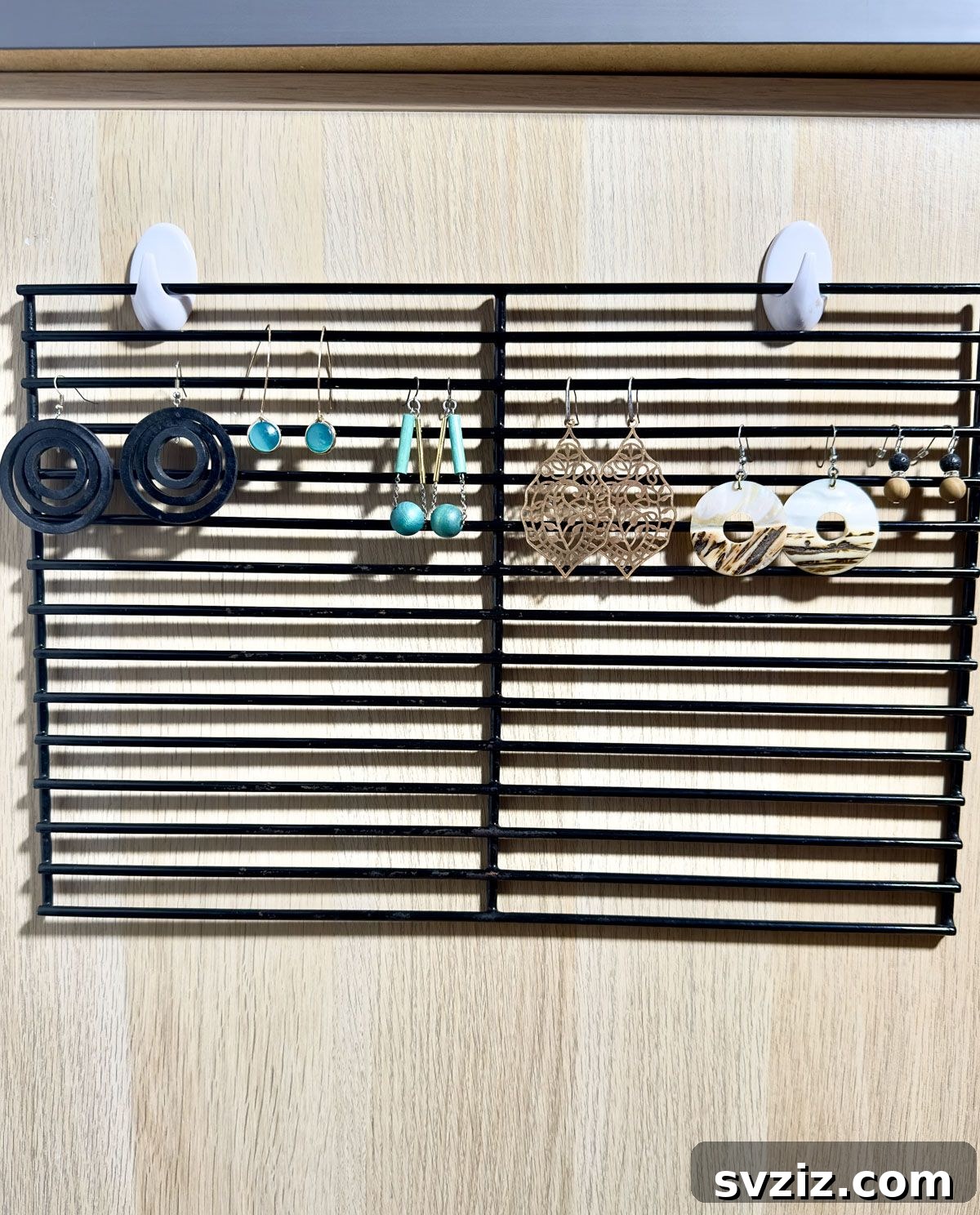 Hang Your Earrings on a Rack Attached to Your Desk - clever jewelry storage