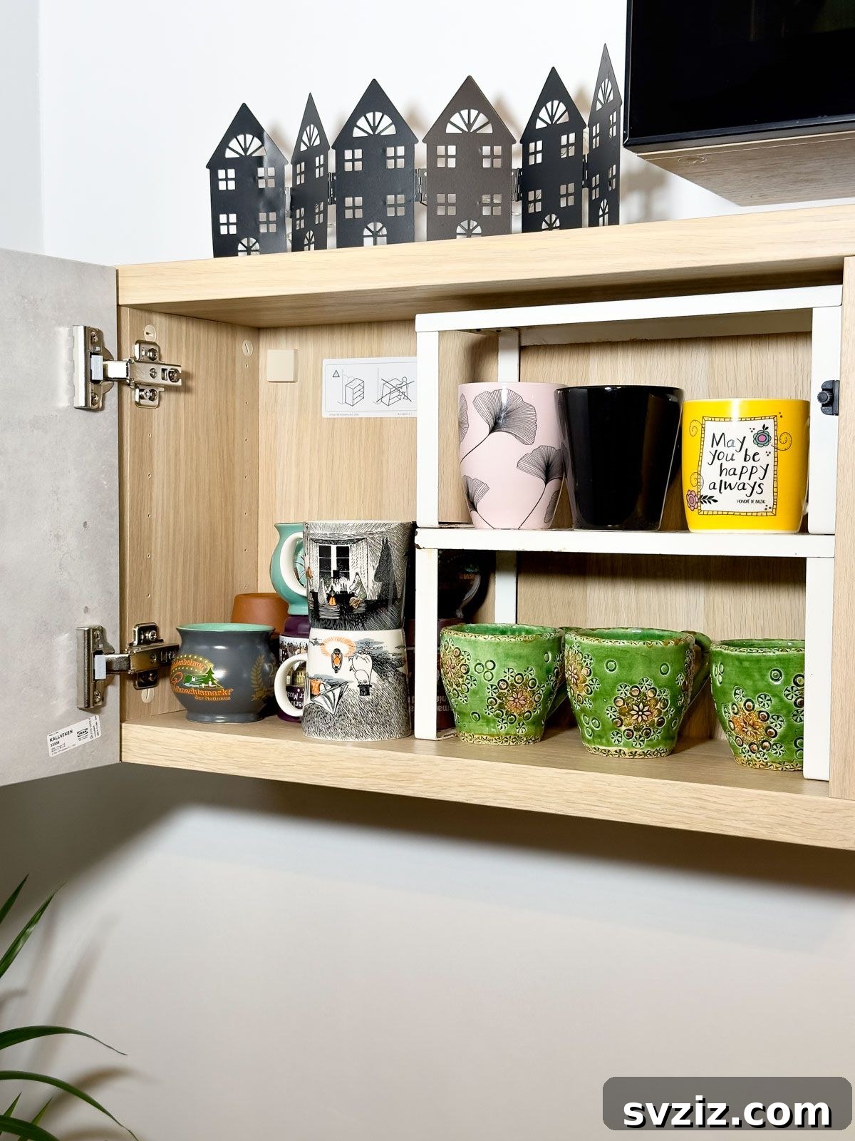 Organize Your Cups with a Shelf Divider - efficient kitchen cabinet storage