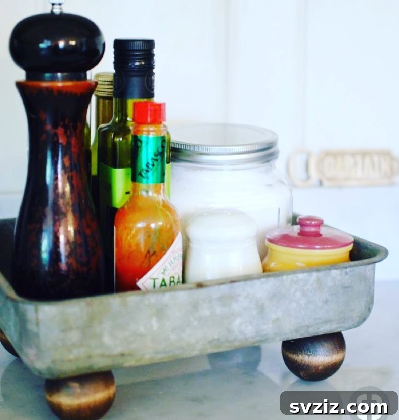 31 Ingenious Kitchen Counter Organization Secrets 26 Upcycle Old Baking Pan for Kitchen Storage