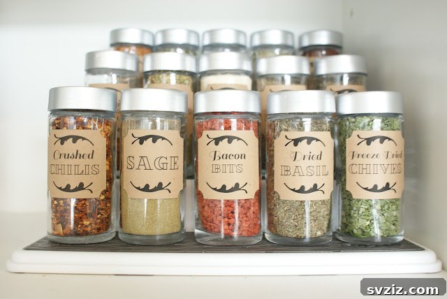 Organized spice jars with labels on a dollar store riser.