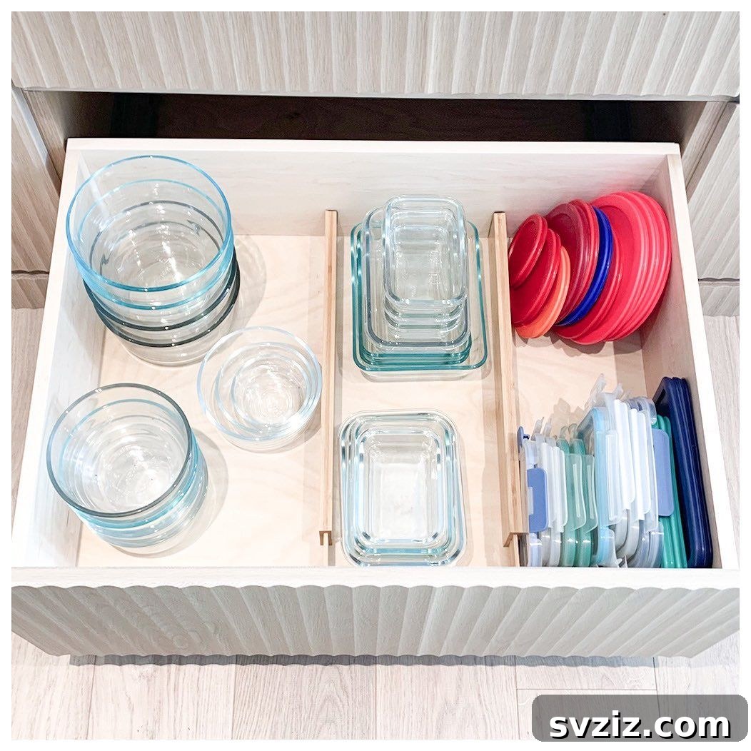 Tame Your Kitchen Drawers 21 Brilliant Organization Ideas 18 tupperware organizers