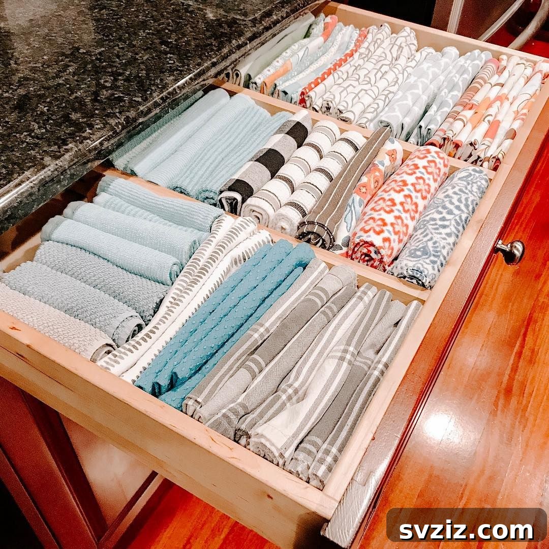 Tame Your Kitchen Drawers 21 Brilliant Organization Ideas 4 Folded Napkins and Towel Drawer
