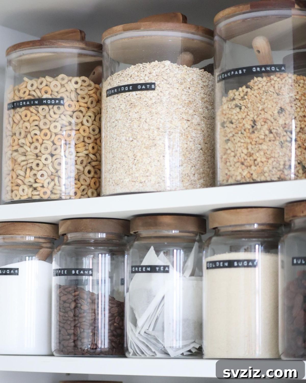 Pantry organization with consistent labeled jars for dry goods