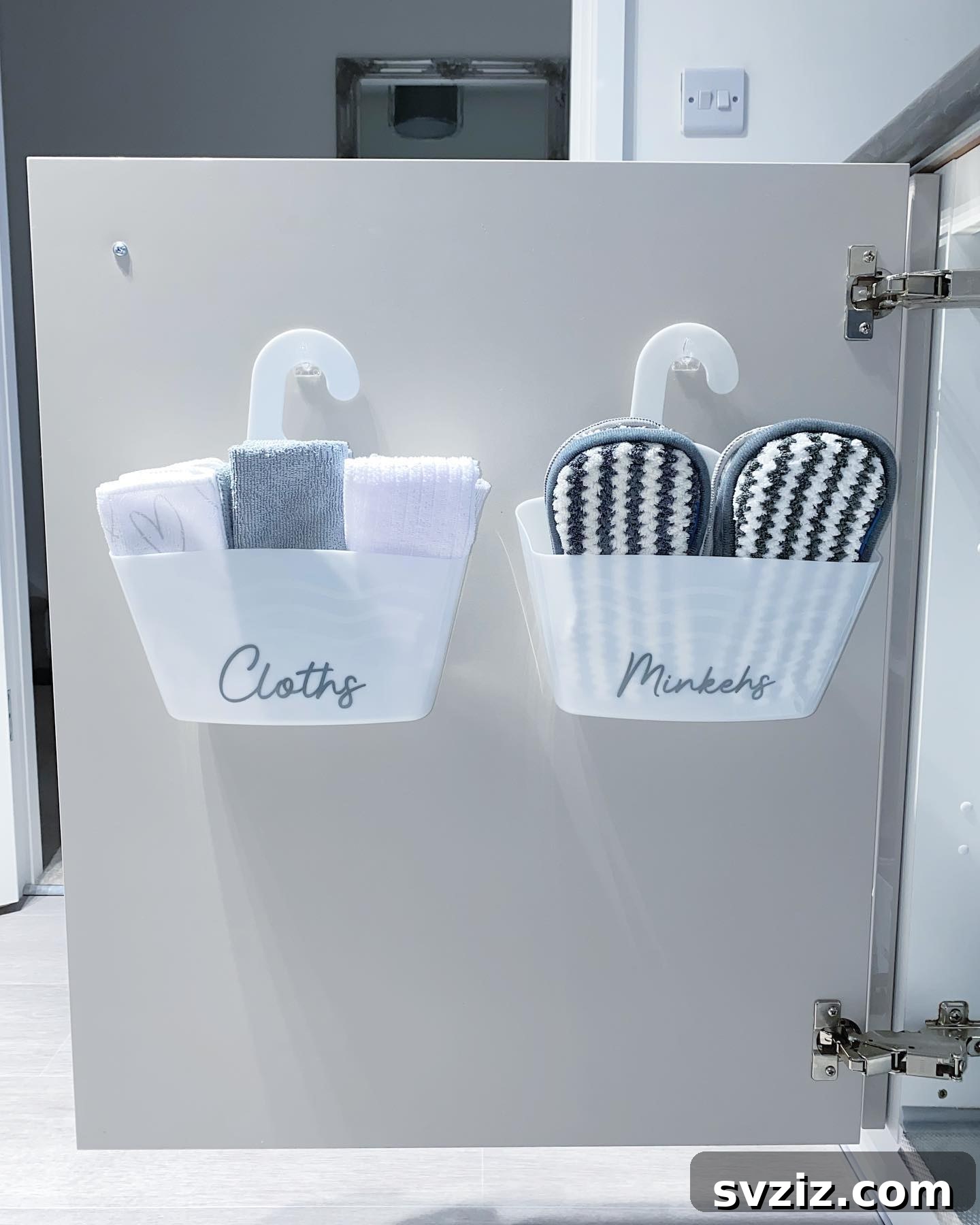Maximize Kitchen Space 29 Genius Hacks 13 under sink door pocket storage