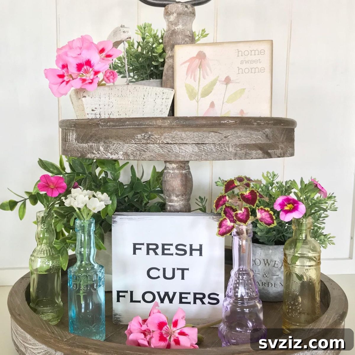 31 Gorgeous Summer Farmhouse Decor Ideas 12 Rustic Tiered Flower Setting