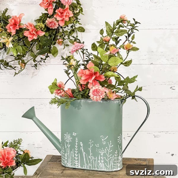 31 Gorgeous Summer Farmhouse Decor Ideas 22 Watering Can Vase