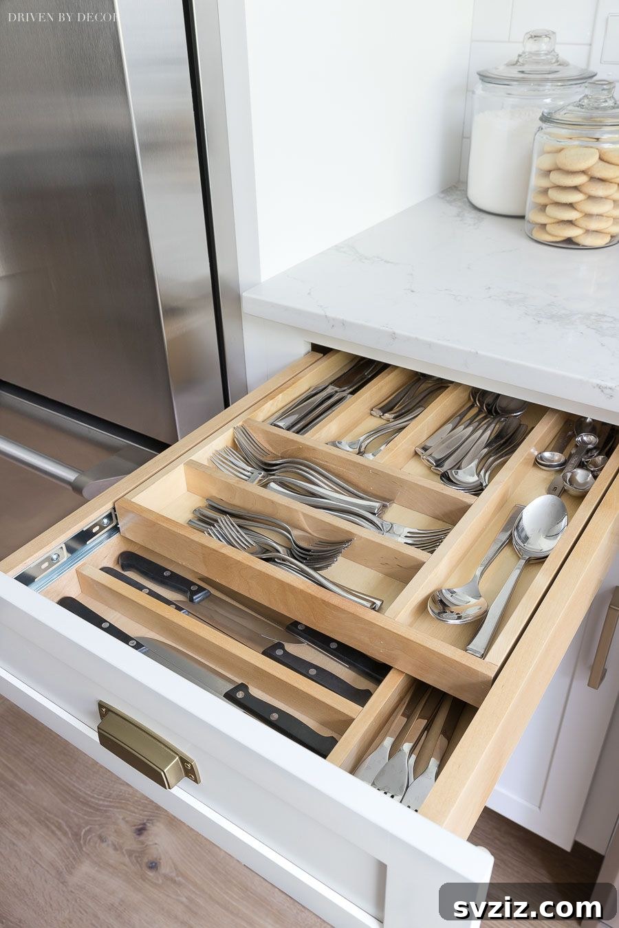 Reclaim Your Kitchen: 31 Smart Cabinet Storage Secrets 29 two tiered divided cutlery drawer