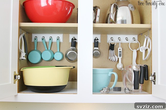 repurposed key rails for measuring cups