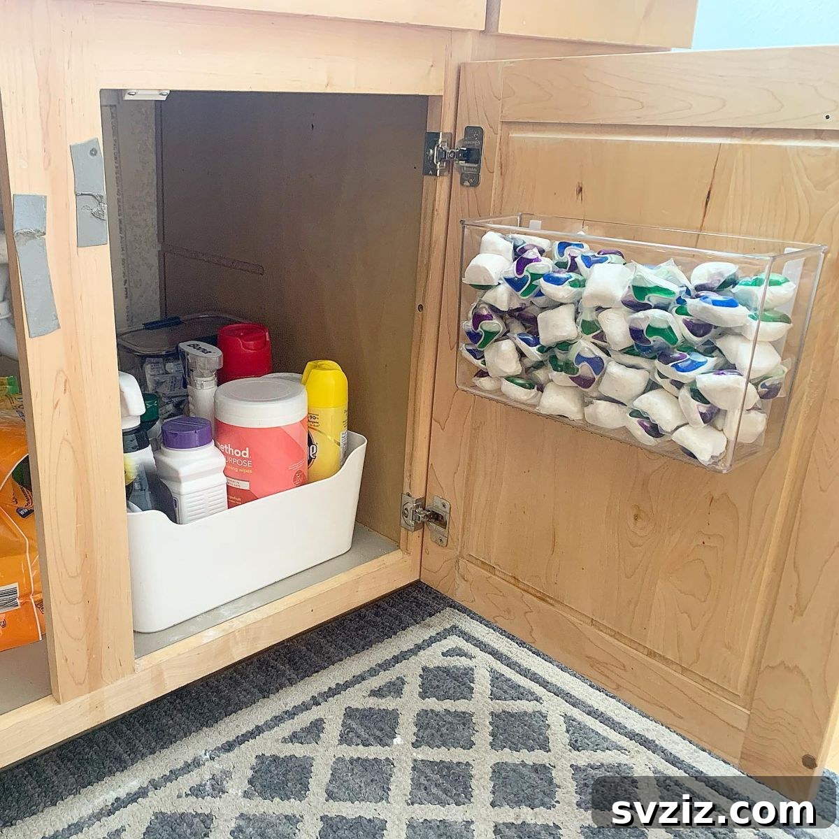 Install adhesive bins inside kitchen cabinets or pantry doors for hidden storage of small items like spice packets or cleaning supplies.