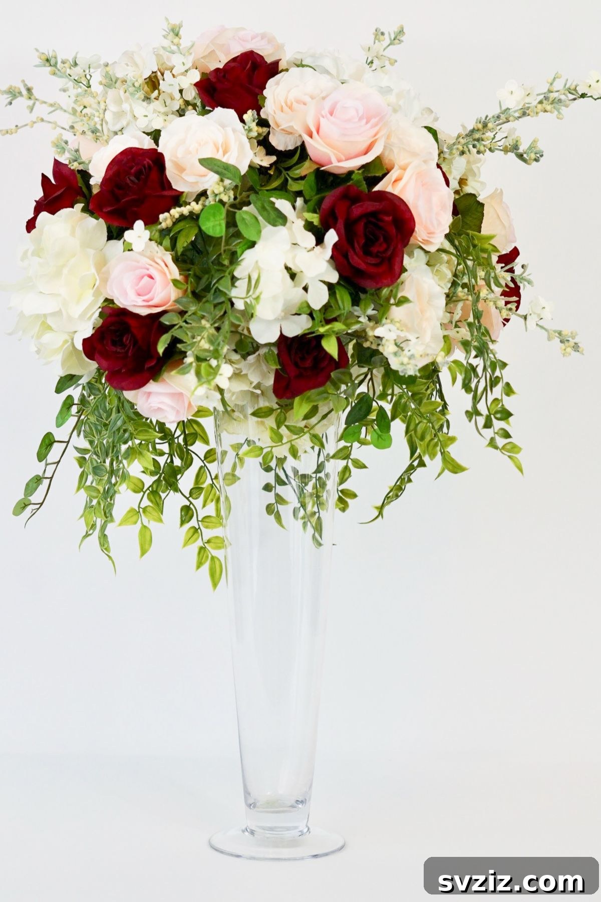 27 Elegant Round Table Wedding Centerpiece Inspirations 29 DIY tall romantic rose blush and burgundy wedding centerpiece for a classic and sophisticated look.