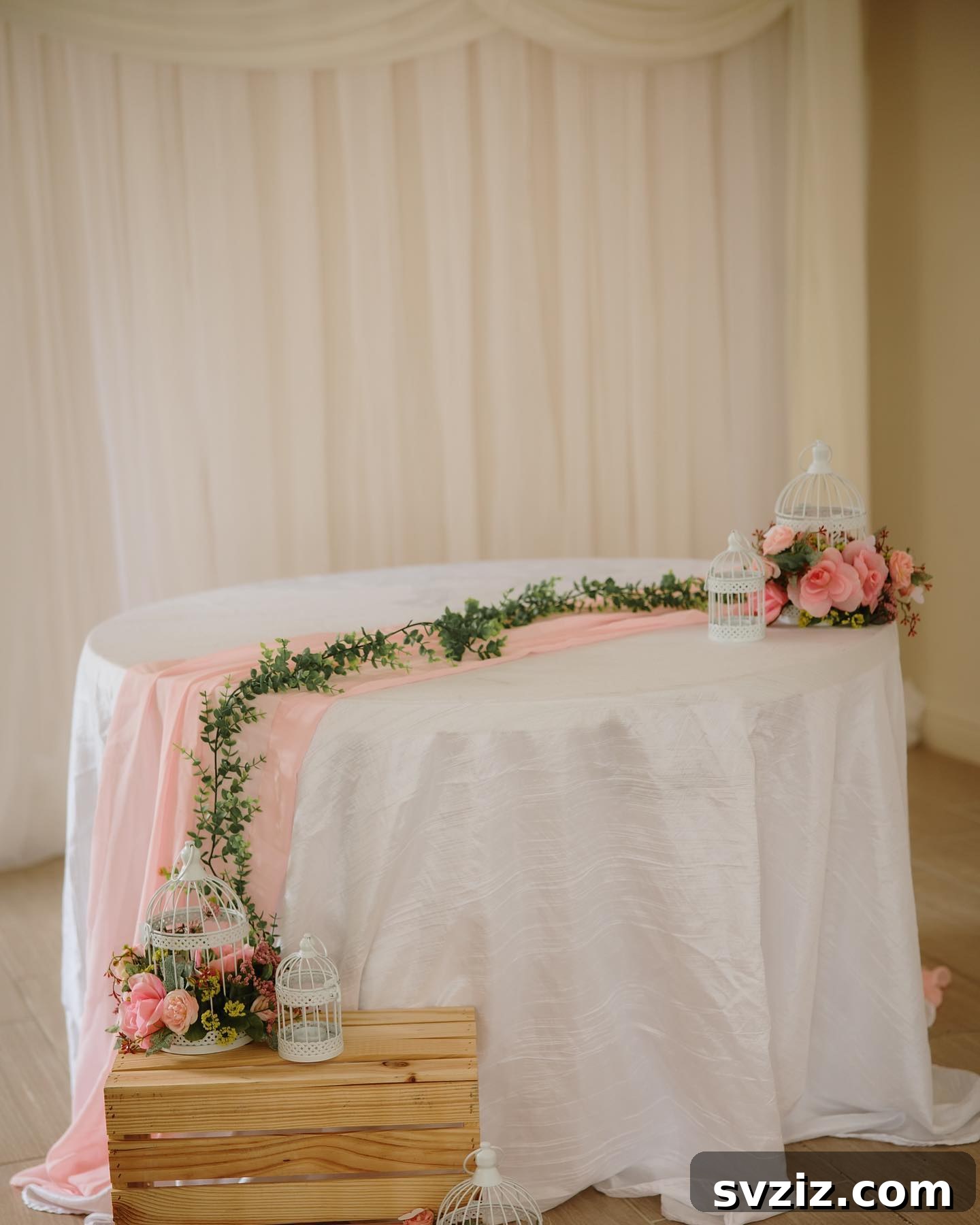 27 Elegant Round Table Wedding Centerpiece Inspirations 6 Sophisticated round table with classic pink table runners and floral centerpieces.