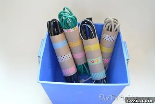 Pocket-Friendly Productivity: 31 Office Organization Hacks 6 Washi Tape Cord Organization using decorated toilet paper rolls