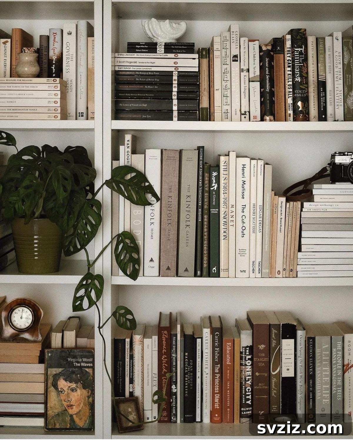 Bookshelf showcasing a dynamic arrangement of books, both horizontally and vertically, adorned with decorative items.