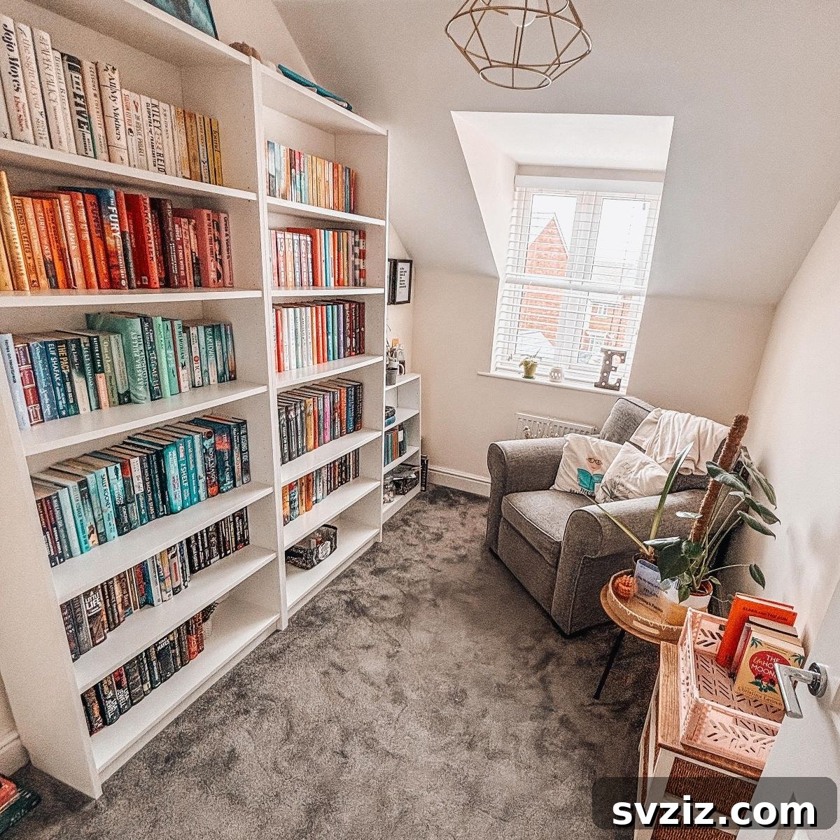 Impressive floor-to-ceiling bookcase maximizing space for a large book collection in a home library.