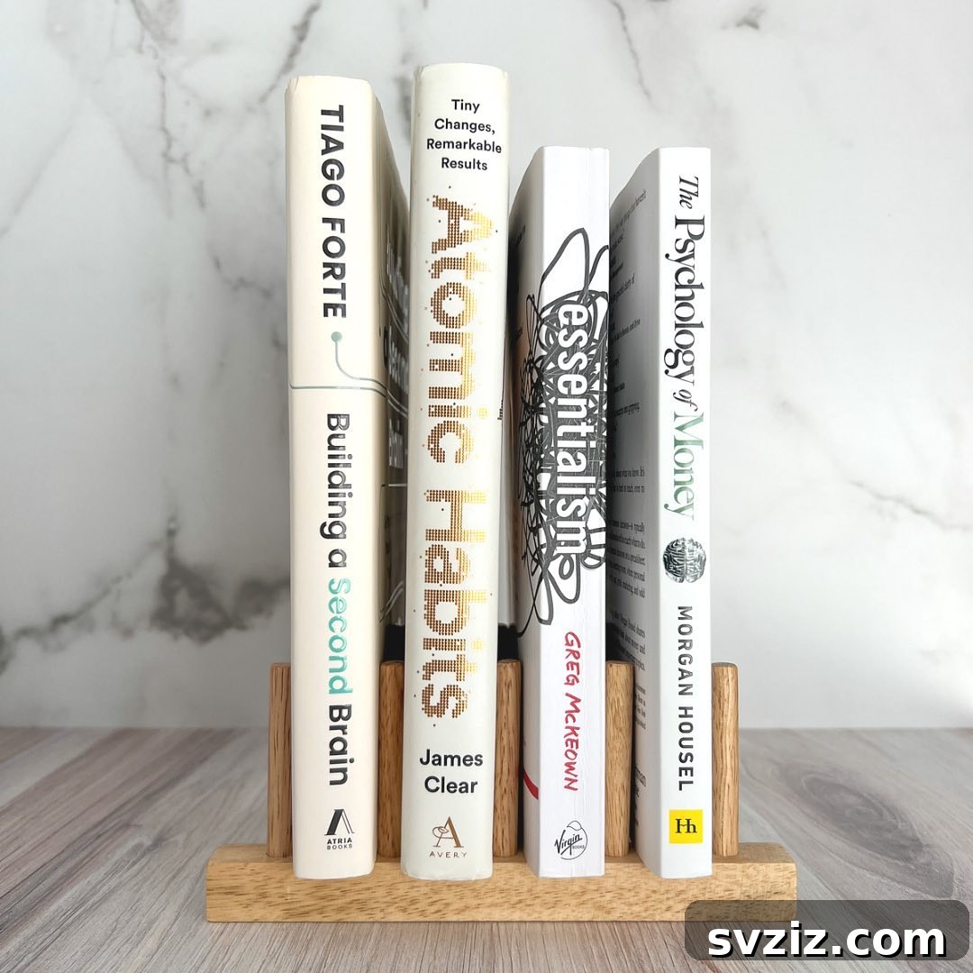 Minimalist bookcase design with curated book selection, promoting a calm and clutter-free aesthetic.