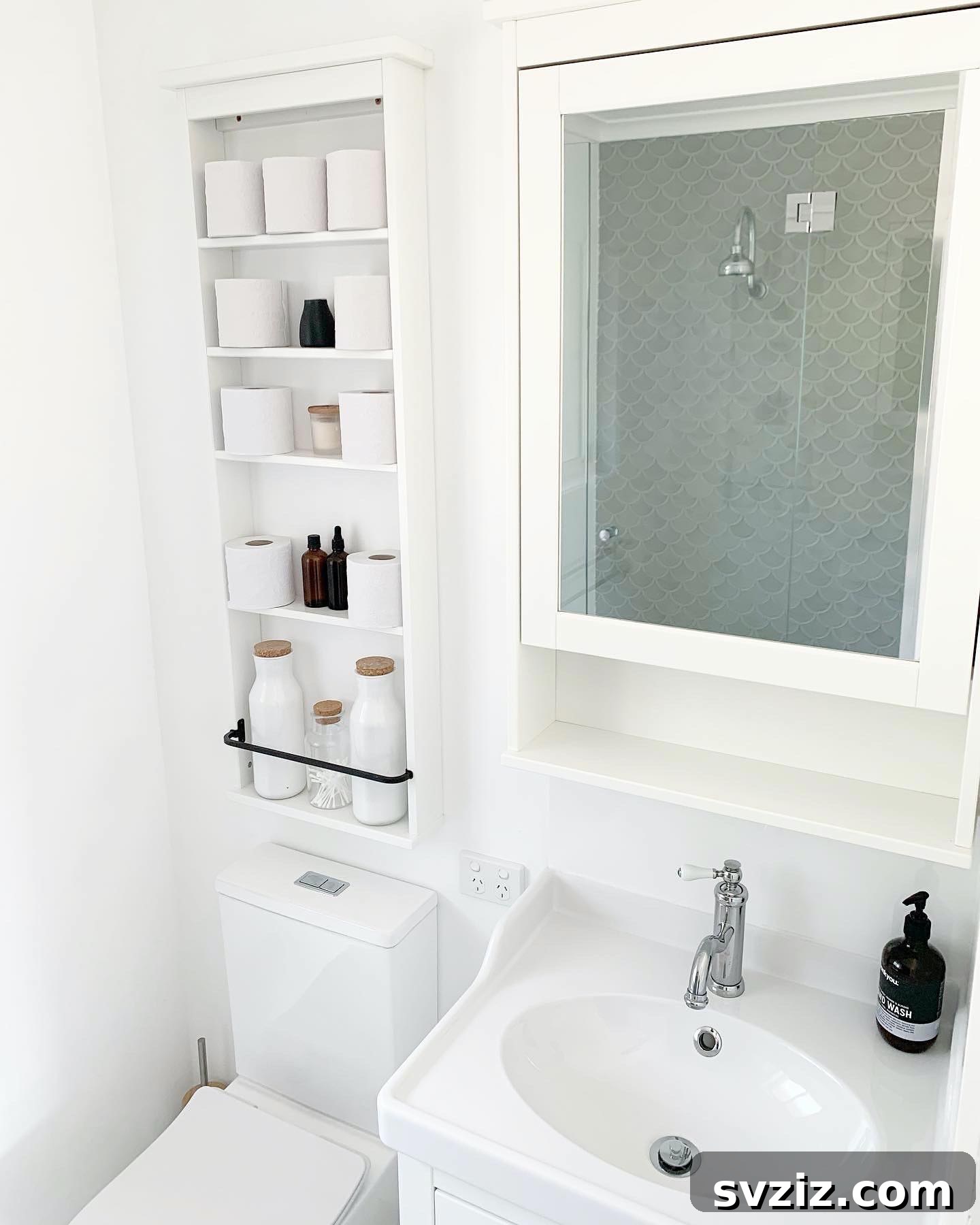 Built-In Bathroom Storage - Elegant recessed shelving for toiletries.