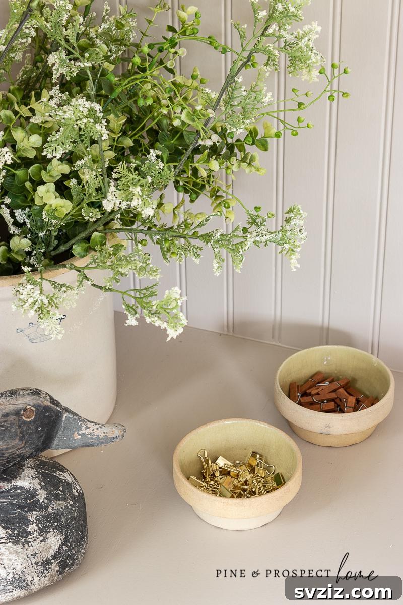 Decorative Storage - Using stylish boxes and trays for organization.