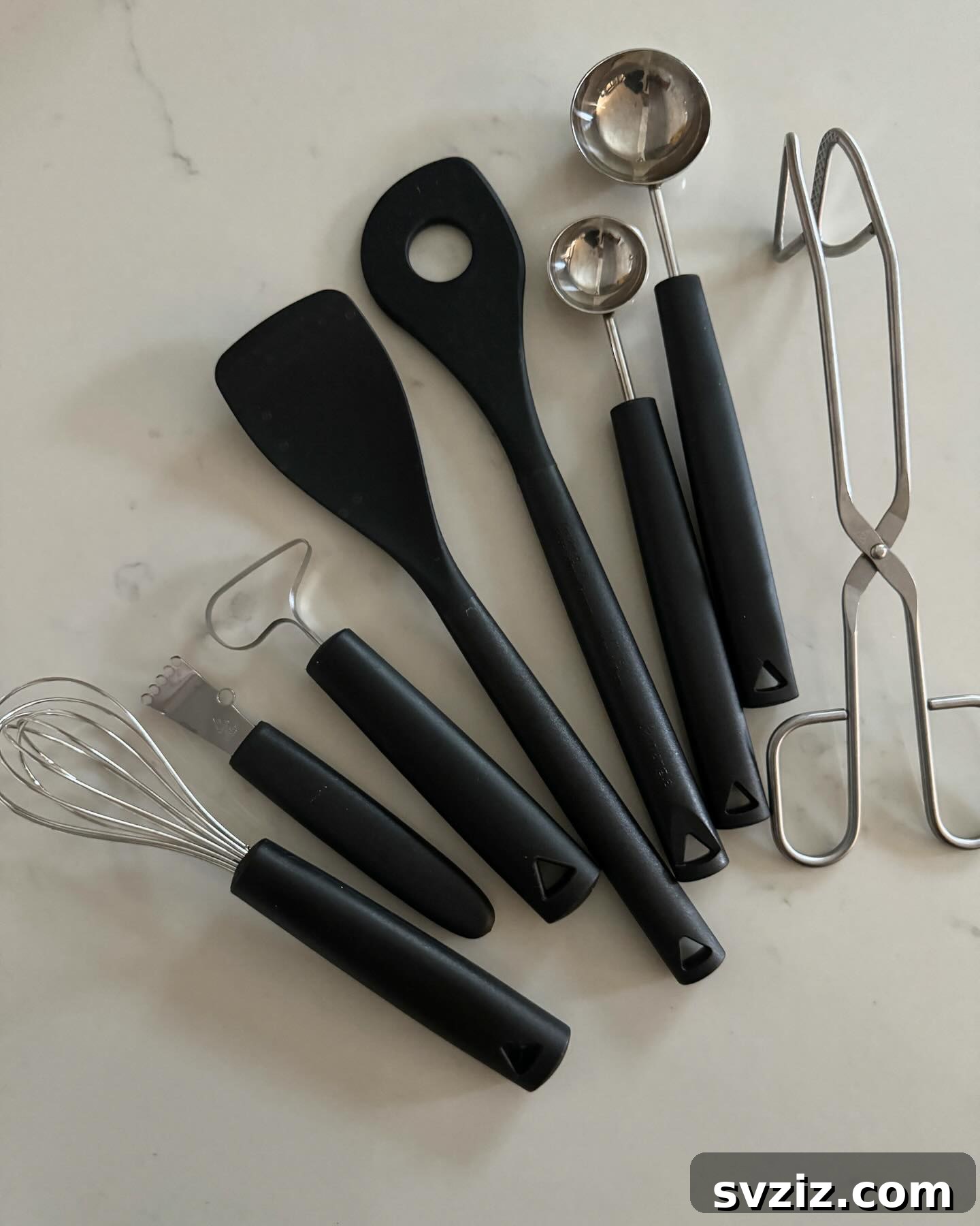 Drawer full of duplicate kitchen tools