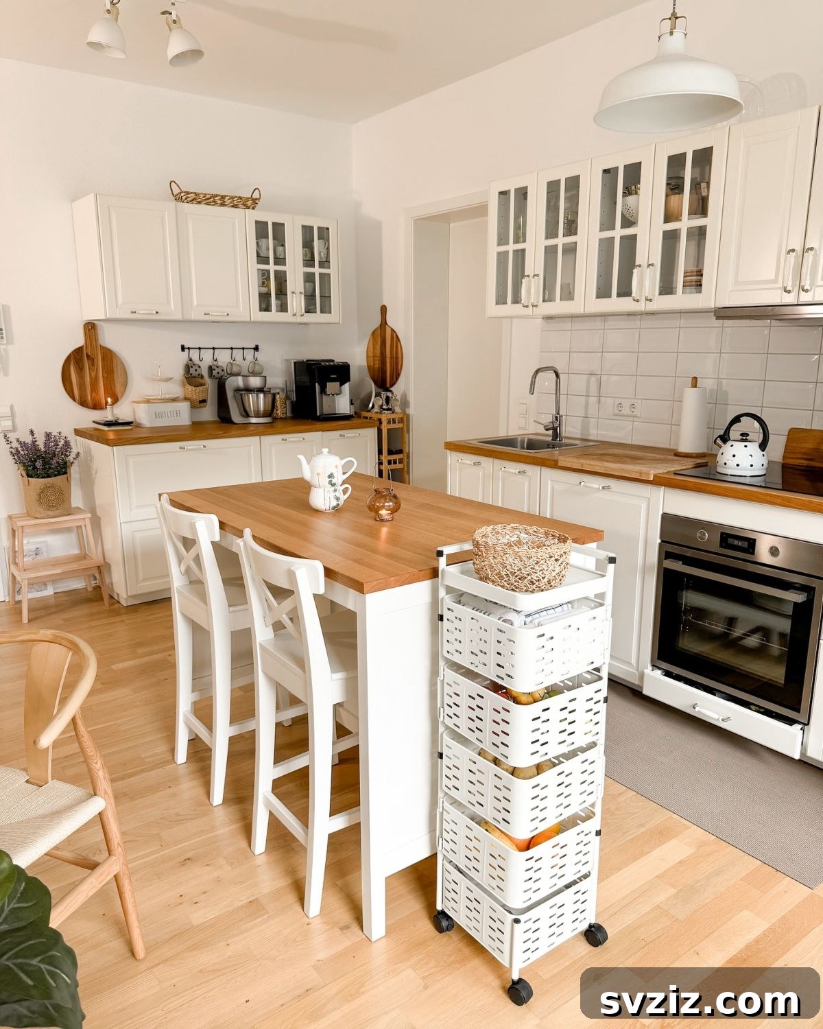 21 Genius Tricks to Tame Kitchen Clutter 14 Mobile kitchen trolley with shelves organized with various kitchen items