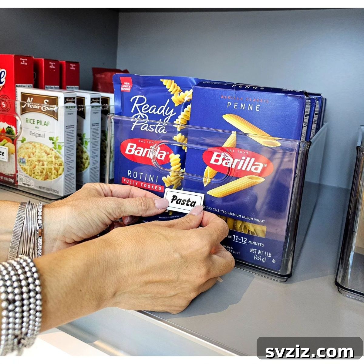 21 Genius Tricks to Tame Kitchen Clutter 6 Pantry shelves with clear, labeled bins for various food items