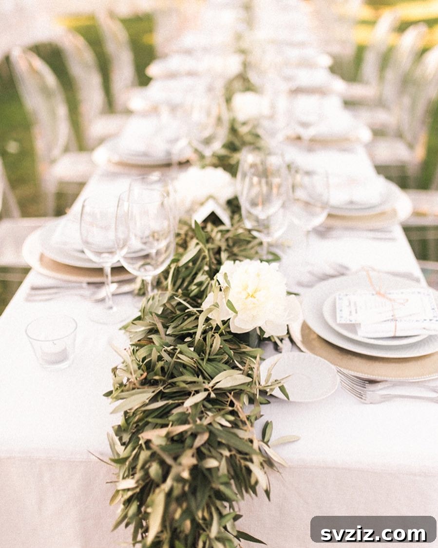 21 Breathtaking Boho Wedding Centerpiece Designs 20 Elegant Greenery Garland Boho Wedding Table Runner