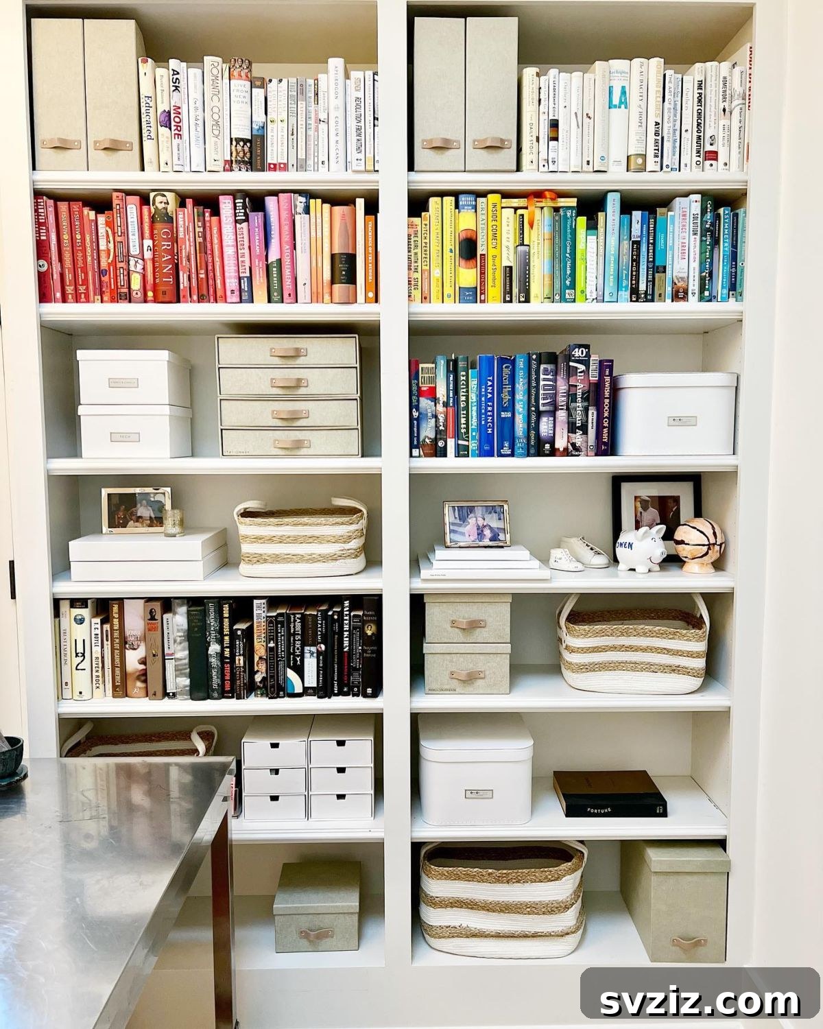 Rainbow Organized Books in Storage Bins for a Playful Office