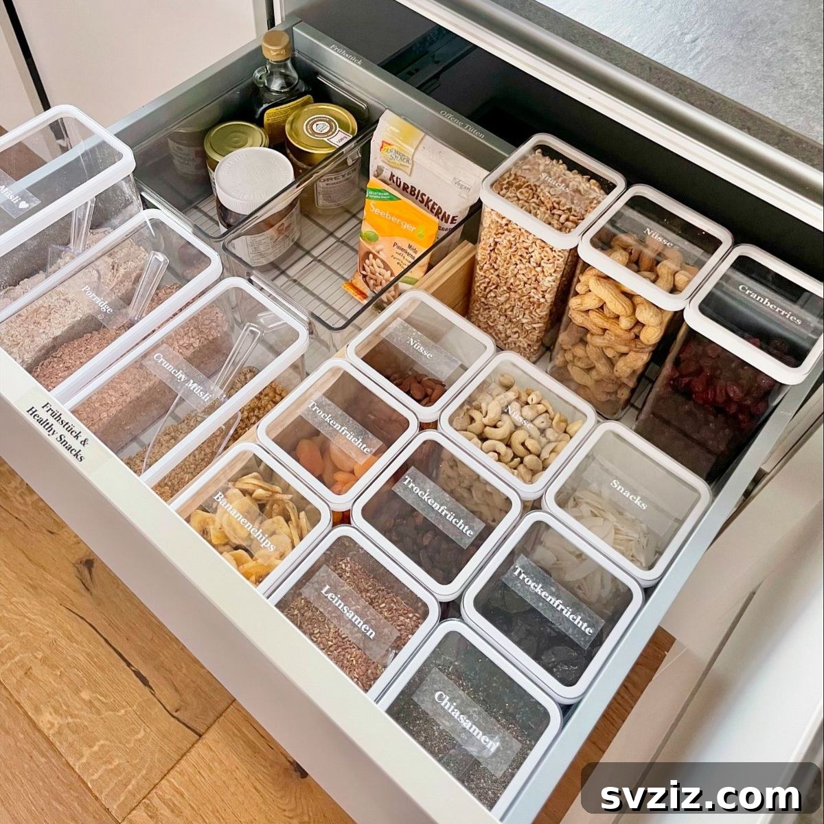 25 Brilliant Storage Hacks for Tiny Kitchens 15 Organized kitchen drawers with matching canisters