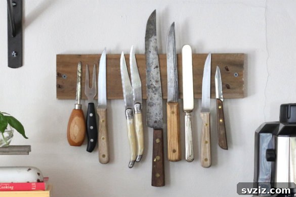 25 Brilliant Storage Hacks for Tiny Kitchens 16 DIY magnetic knife rack made from a pallet board