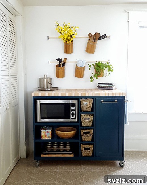 25 Brilliant Storage Hacks for Tiny Kitchens 19 Custom DIY rolling kitchen island with shelves and microwave space