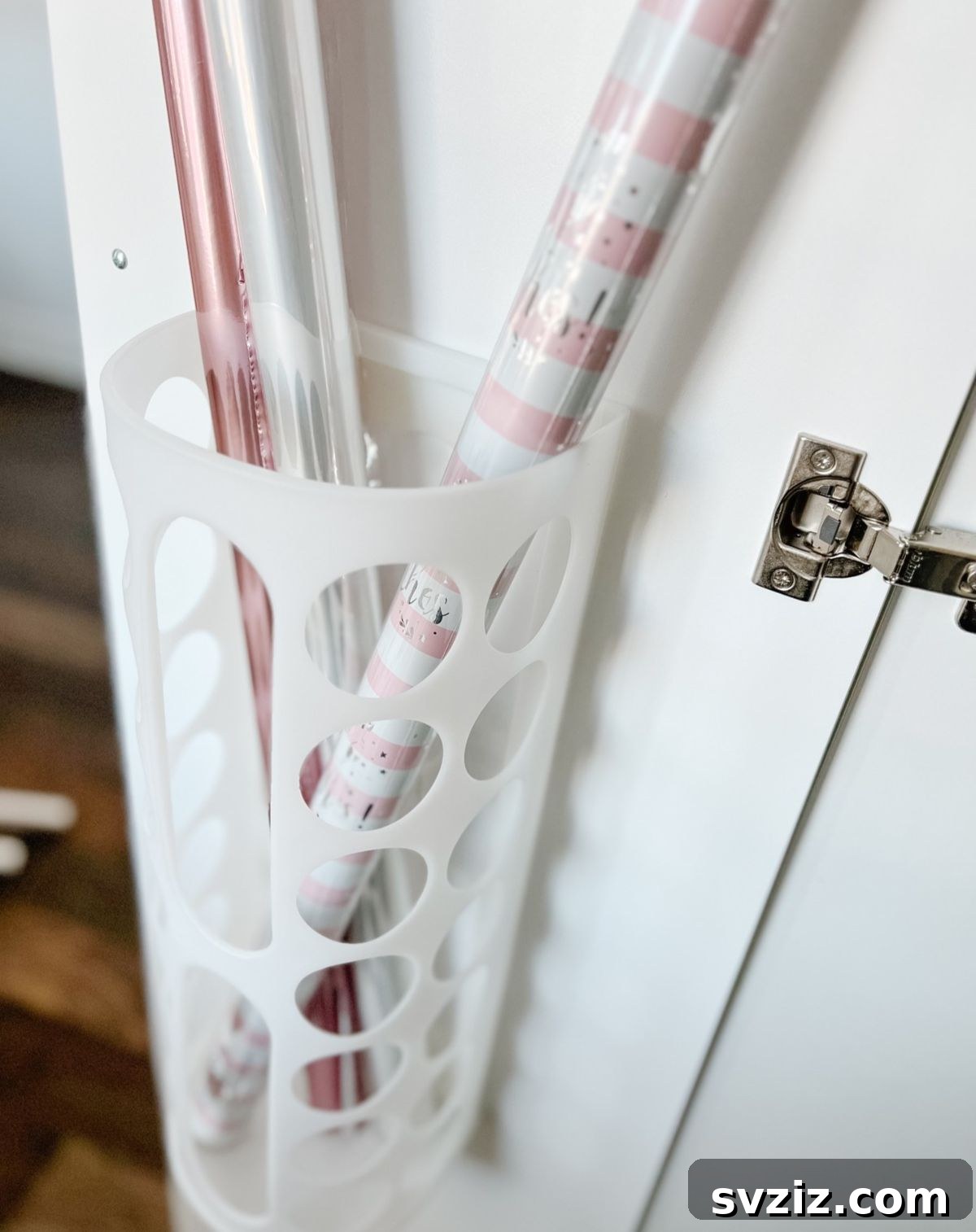 31 Clever IKEA Solutions to Organize Every Room 22 Plastic Bag Dispenser for Gift Wrapper Organization