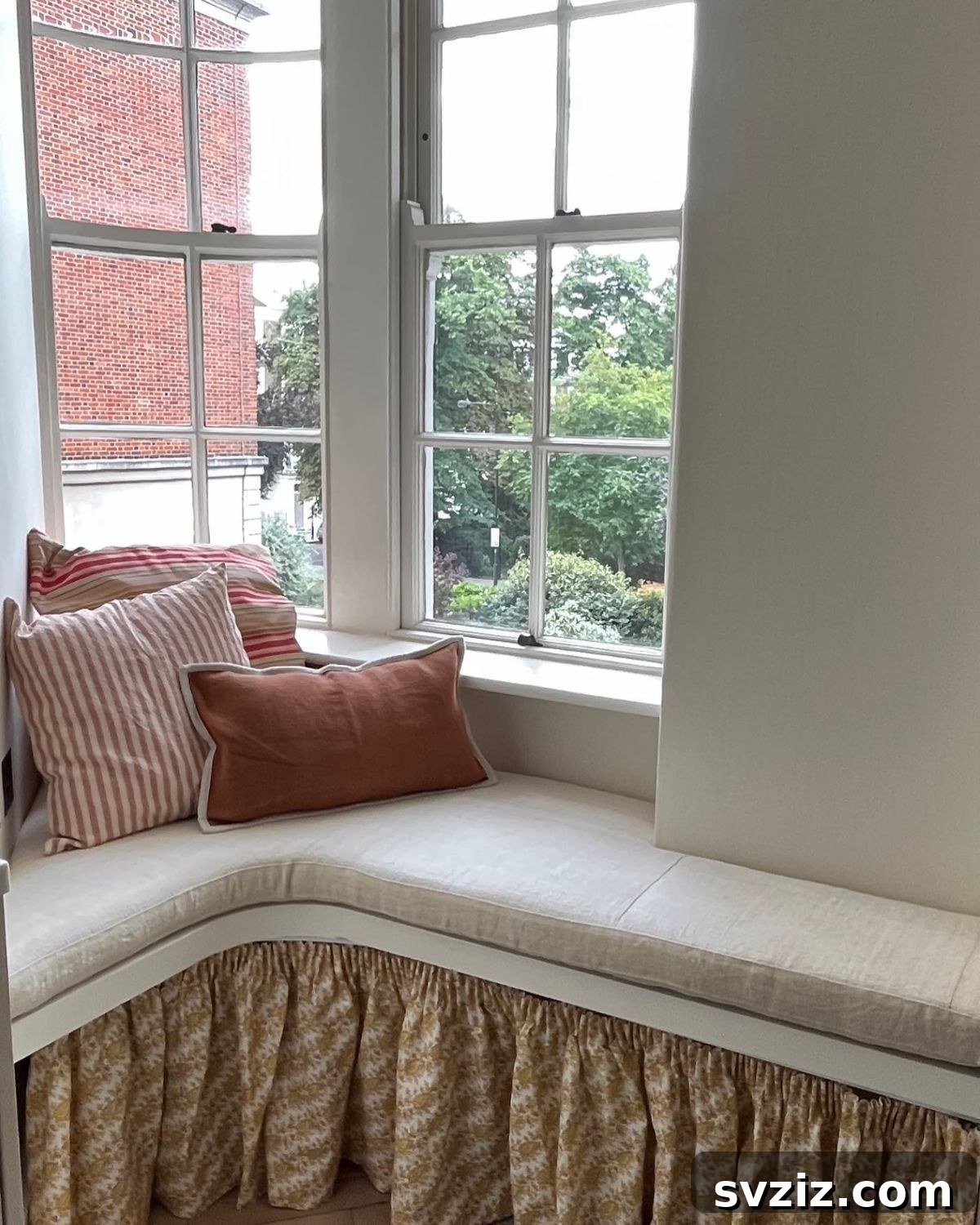 21 Stealthy Storage Solutions to Make Clutter Disappear 18 Window Nook with Built-in Storage Bench