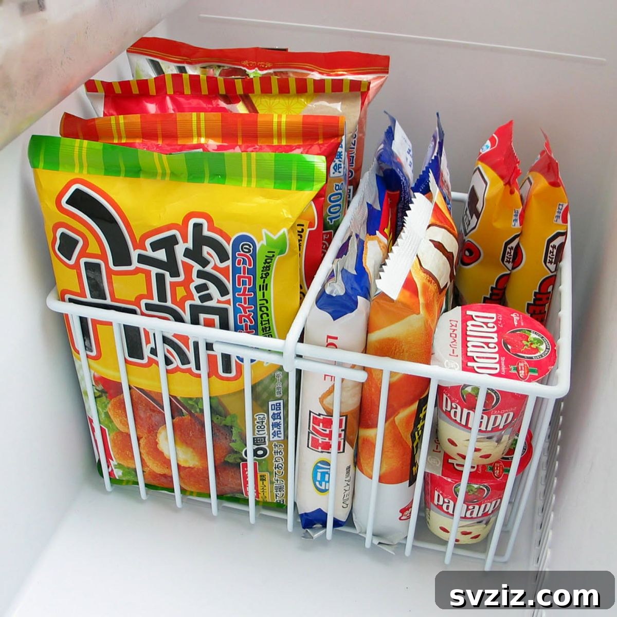 Neat snack storage baskets inside a pantry, categorizing different types of snacks for easy selection.