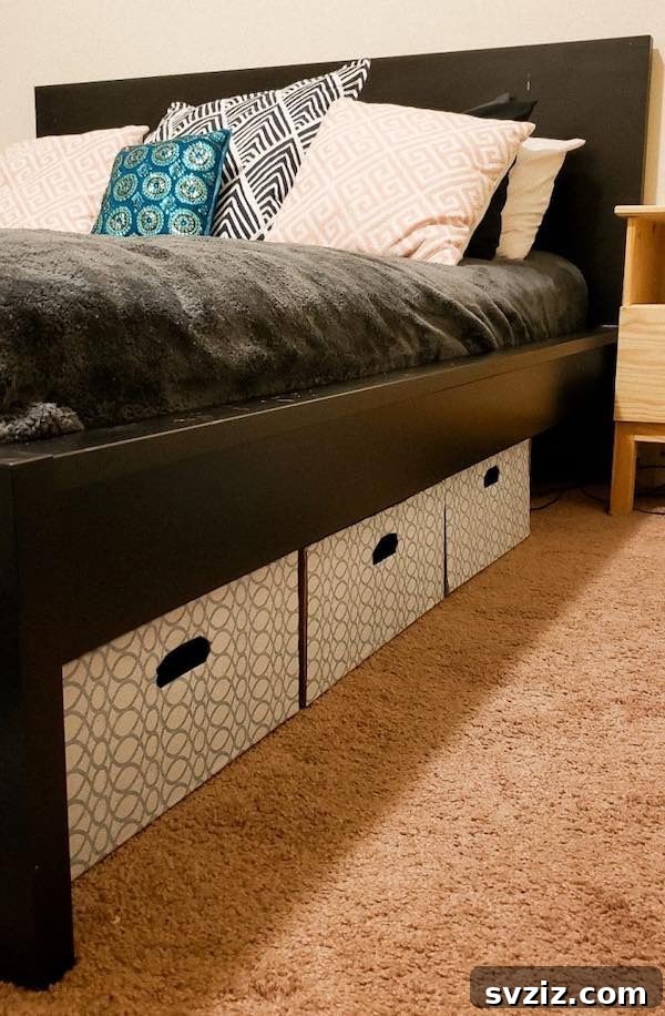 Under-bed storage drawers neatly integrated into a bedroom, offering discreet and accessible space-saving solutions.