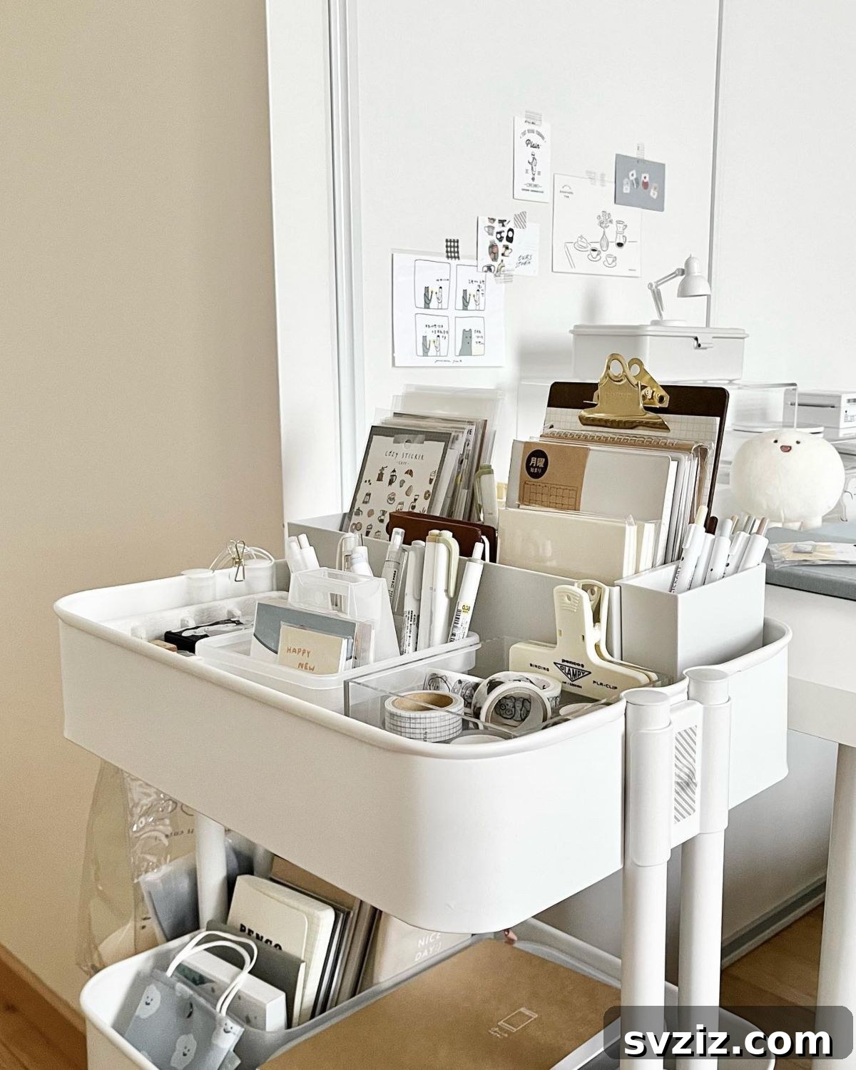 A stylish rolling cart filled with carefully organized stationery and office supplies, showcasing mobile storage efficiency.