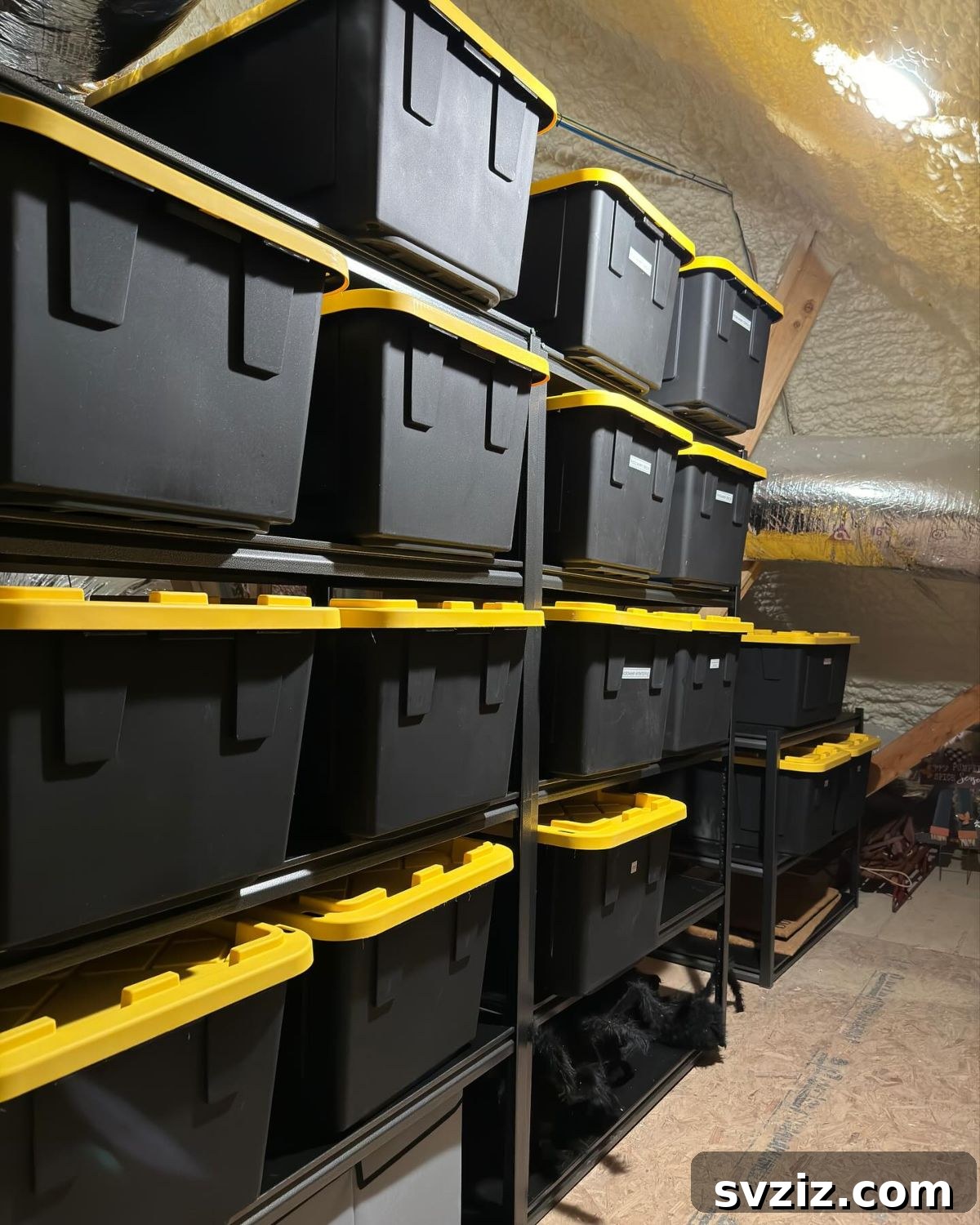 Transform Your Attic: Clever Organizing Secrets 4 Robust shelving units in an attic, holding organized storage tubs