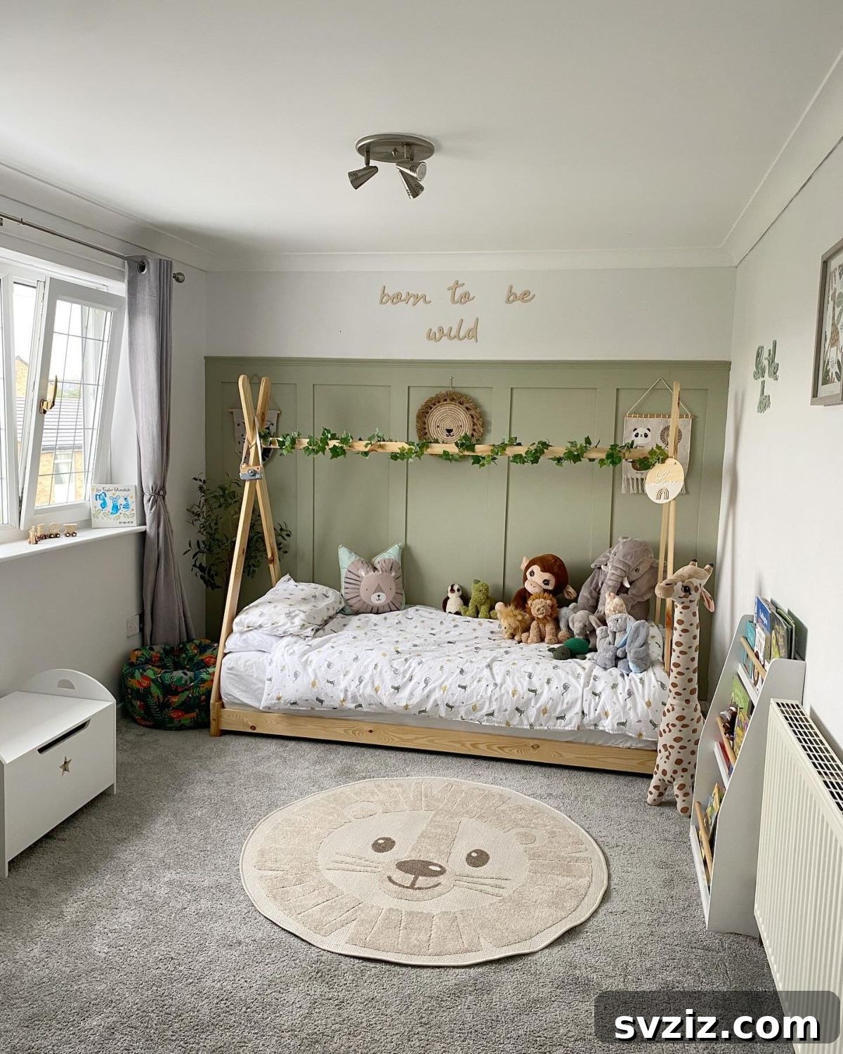 Sweet and cohesive safari themed boy's room decor
