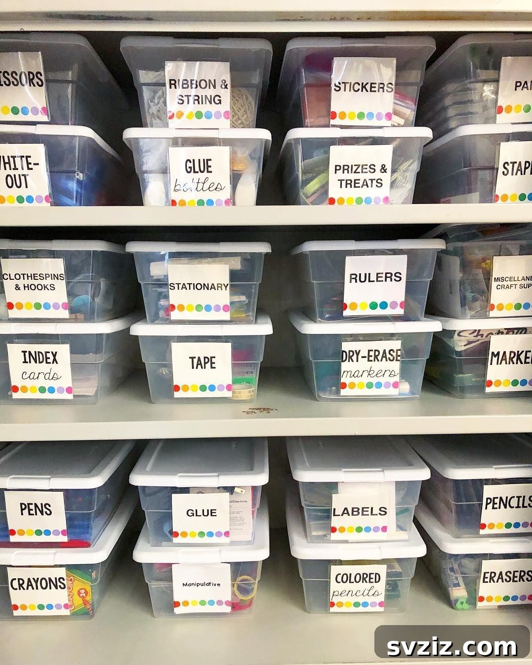 Clear storage bins with labels for classroom supplies