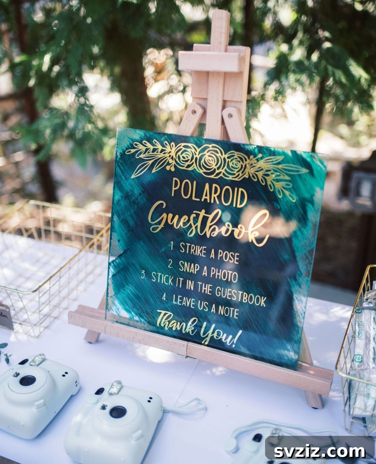 Polaroid camera setup for a wedding guest book