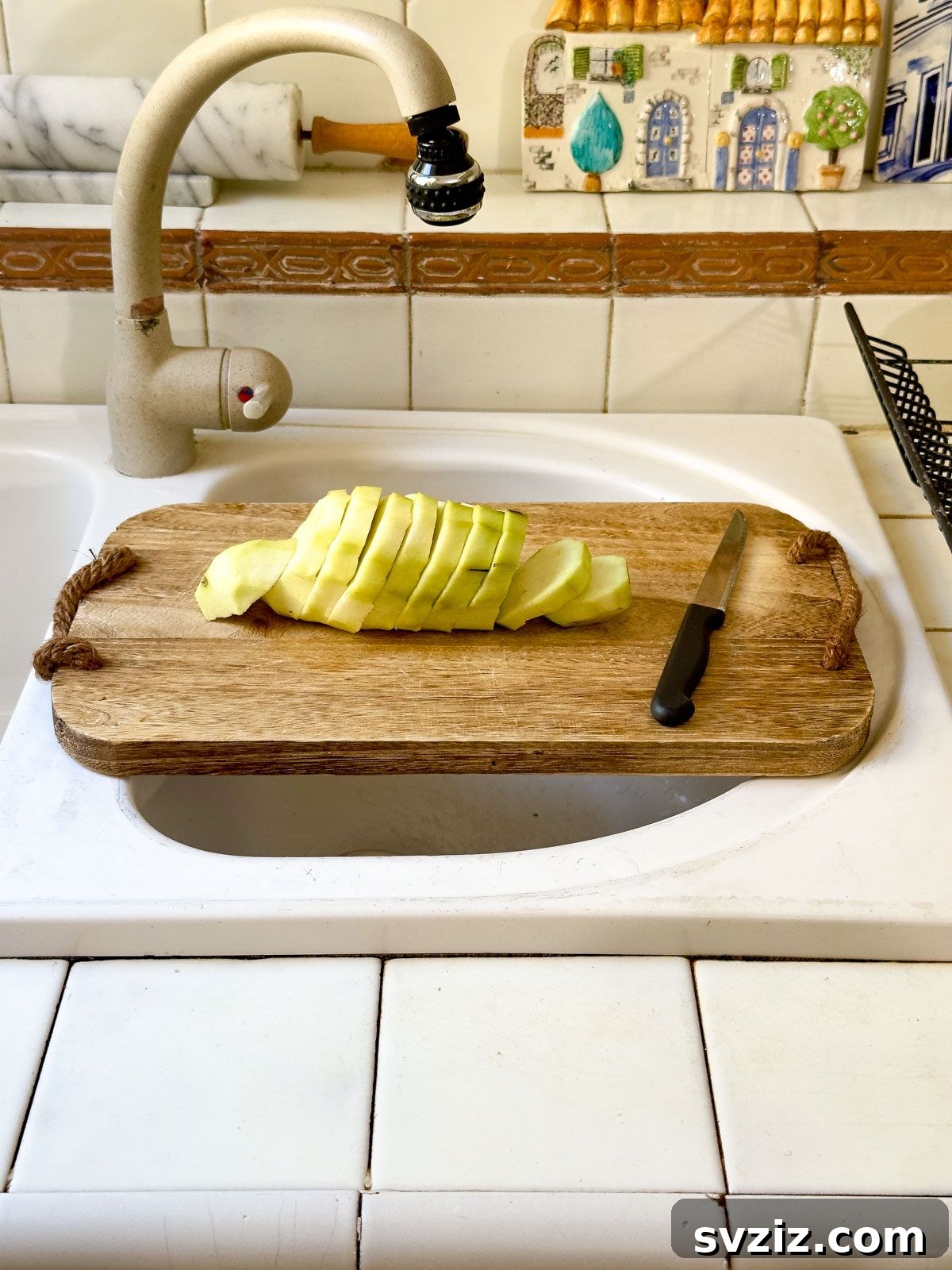 Cut Your Veggies On the Sink for Extra Prep Space in Small Kitchens