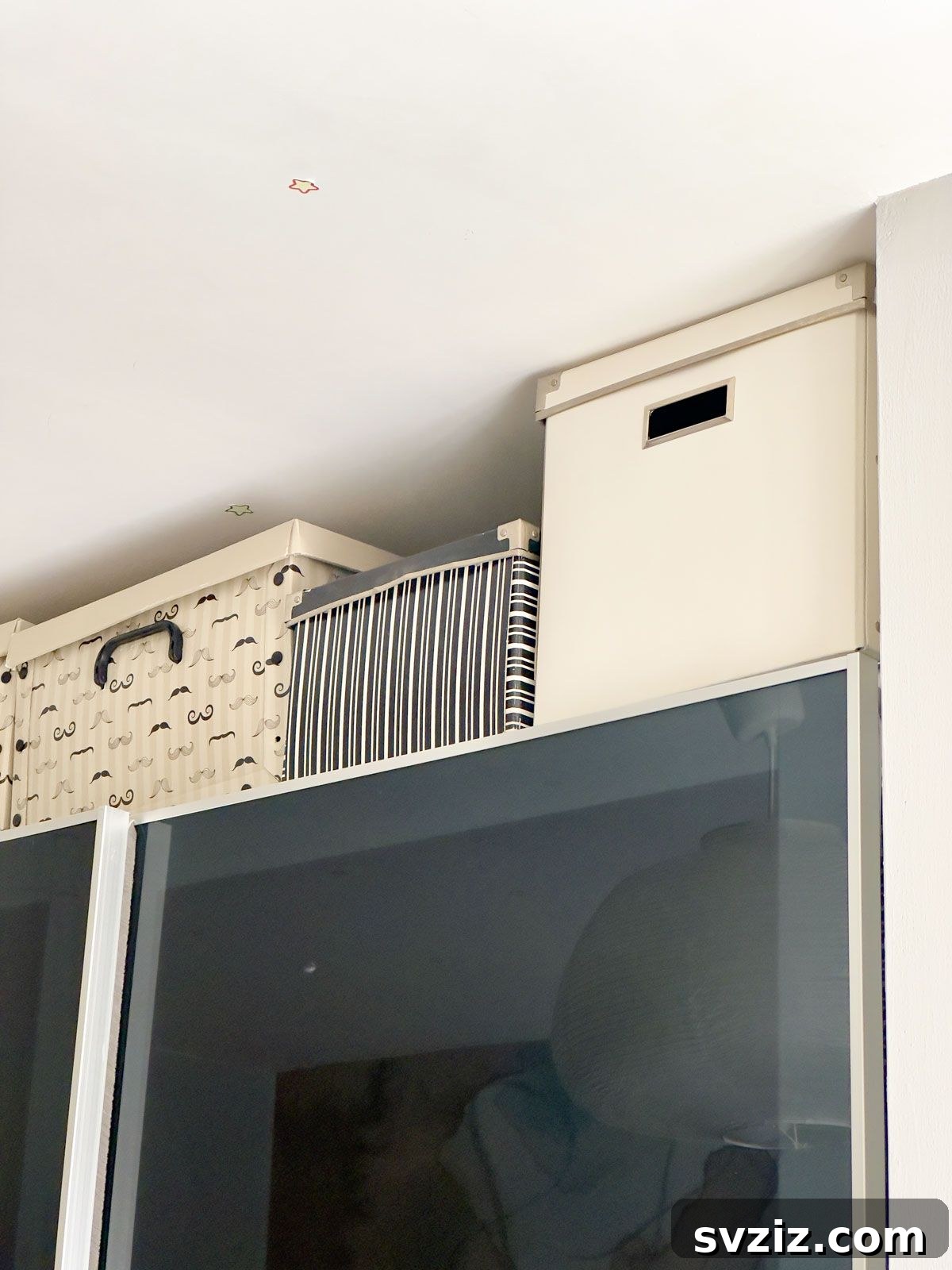 Place Storage Boxes Above Your Closet for Extra Storage