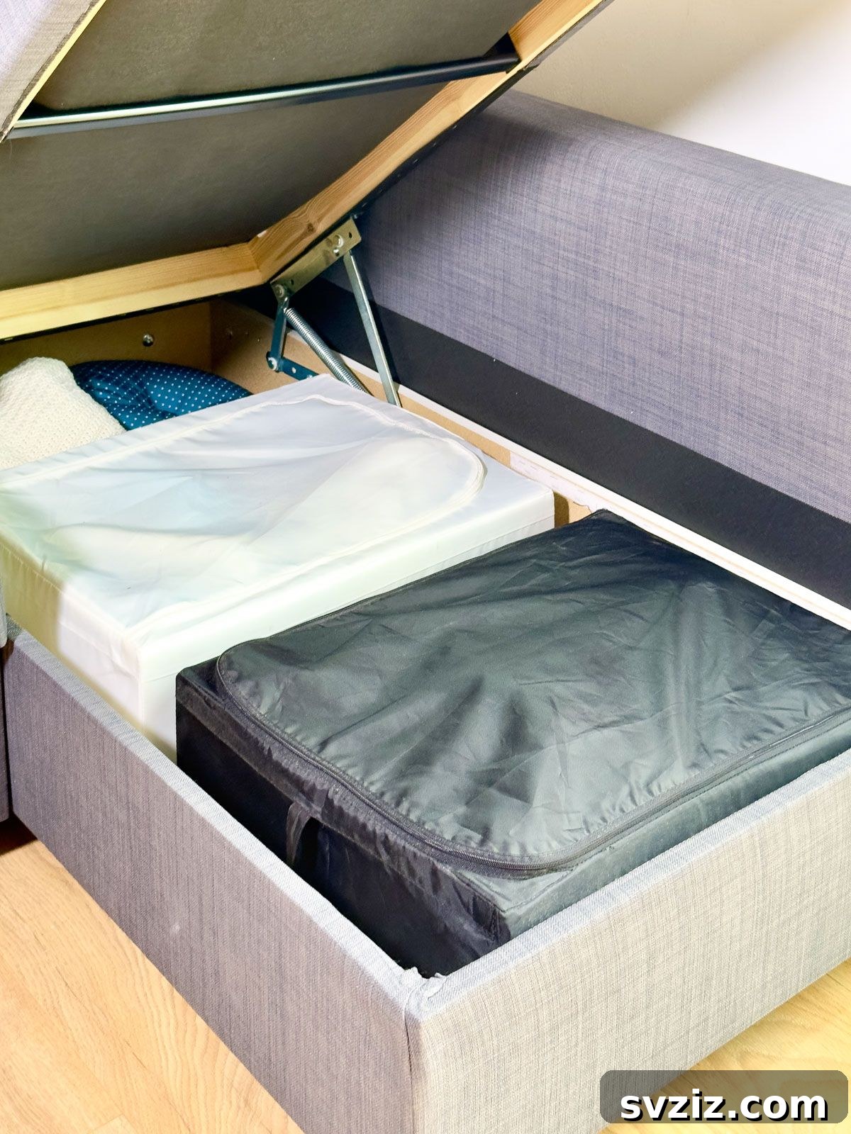 Utilize the Under Sofa Storage for Hidden Organization in a Tiny Home